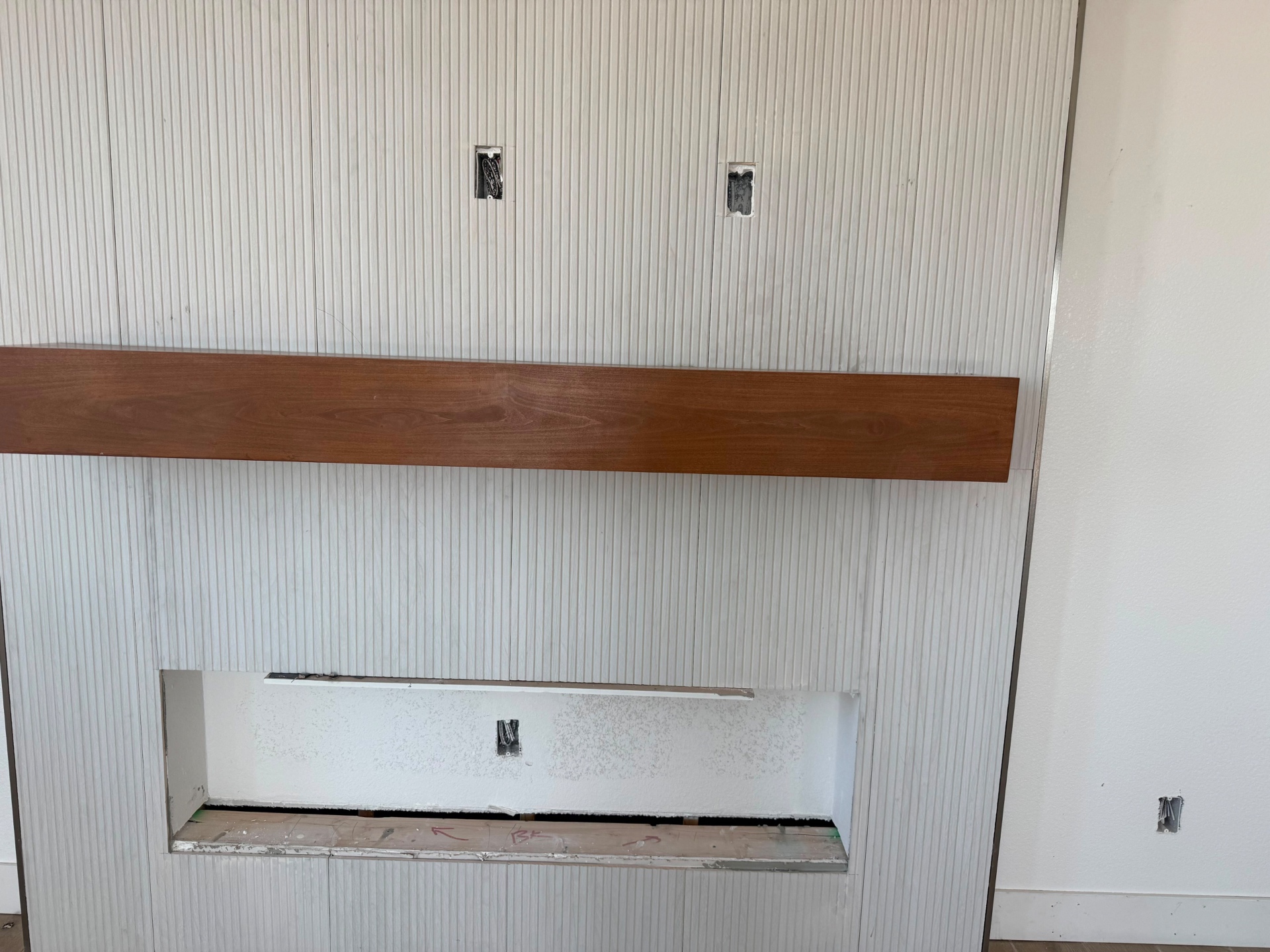 Wood ledge and panel cabinetry detail