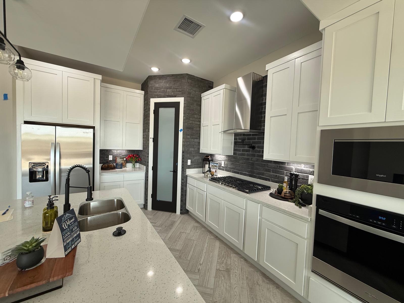 White kitchen with tile backsplash