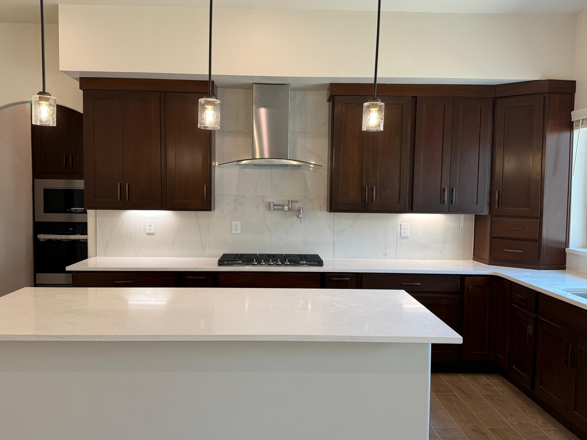 Espresso wood cabinets and countertop detail