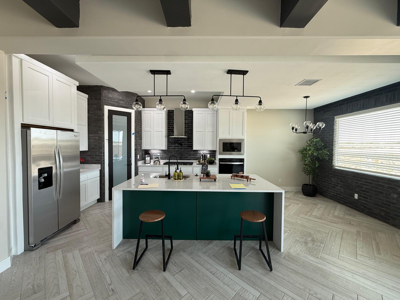 Kitchen with green island