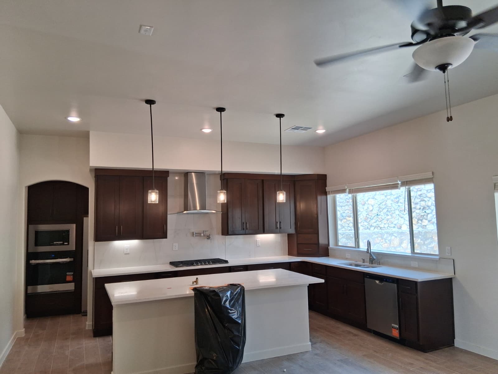 Stained wood kitchen cabinets